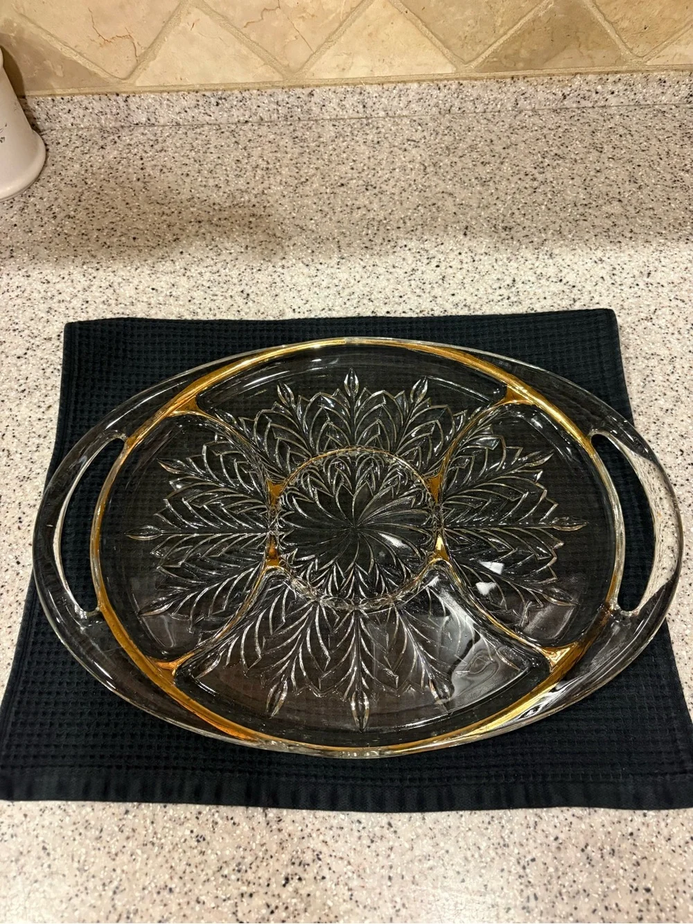 Vintage 5-section glass serving tray is likely a 1950s Jeannette